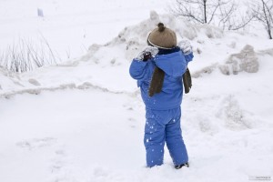 A child playing in the snow